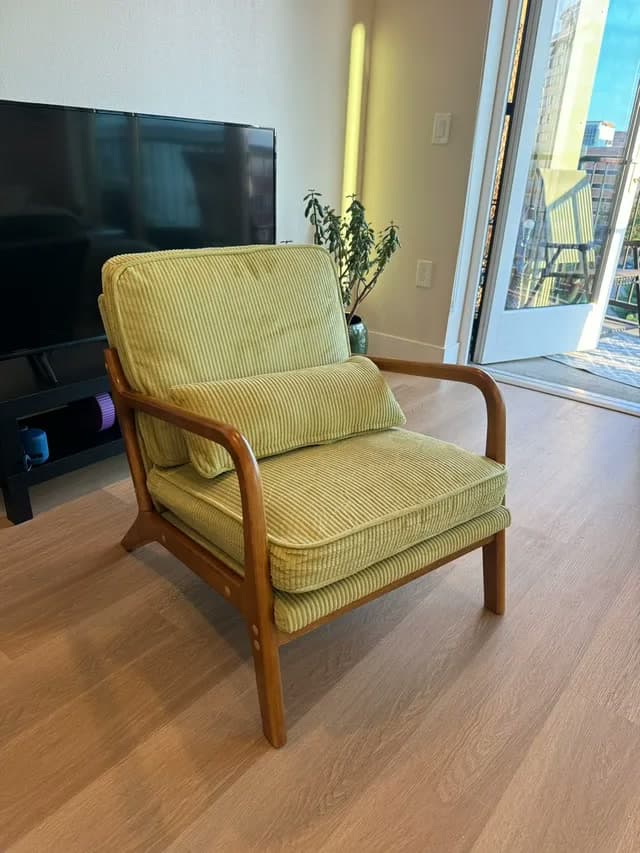 An assembled accent chair in a bright living room